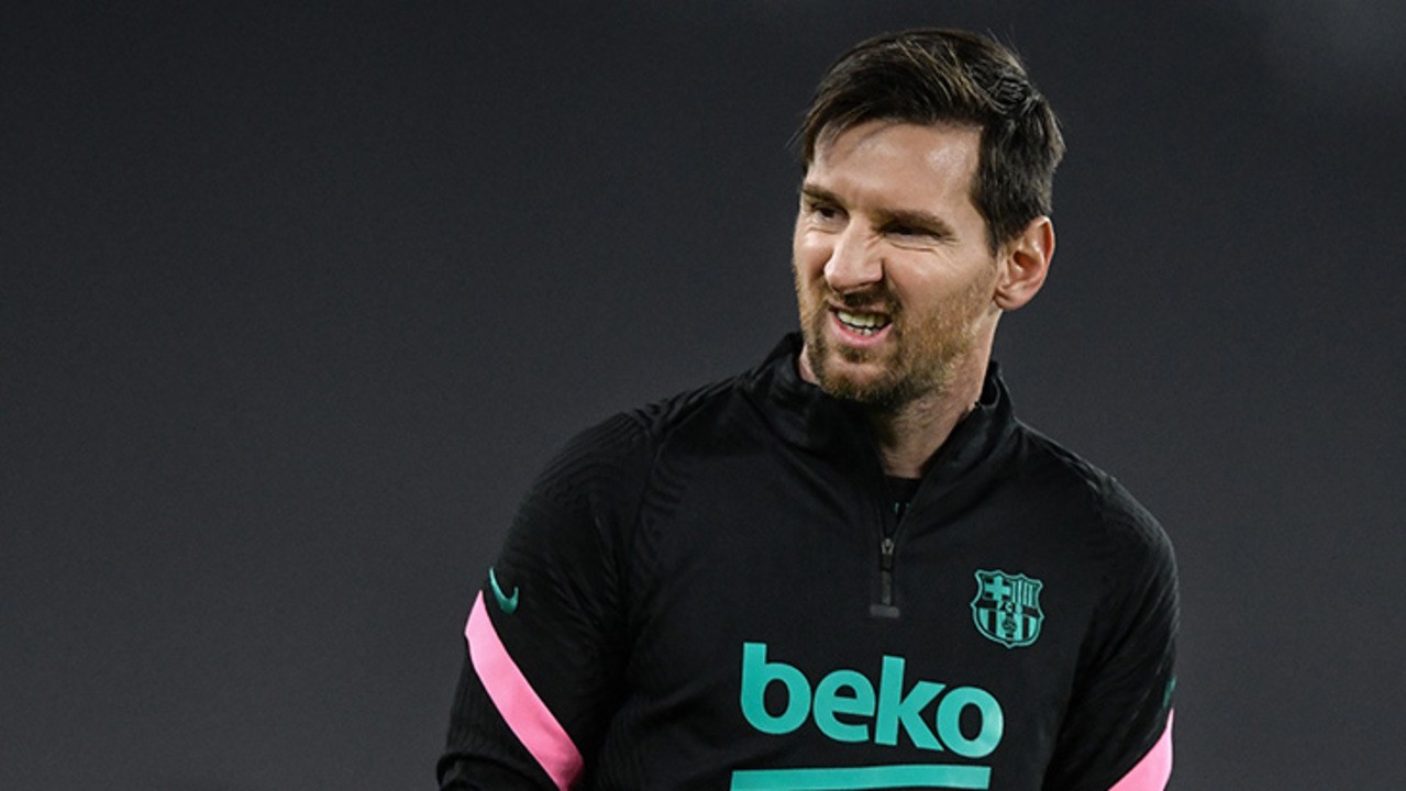 messi-grimace-barca-training