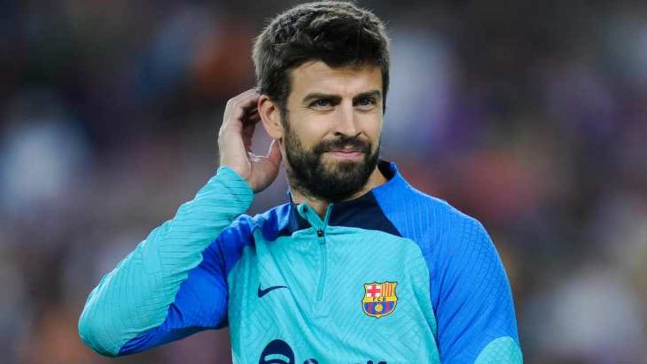 pique-barca-sourire-training