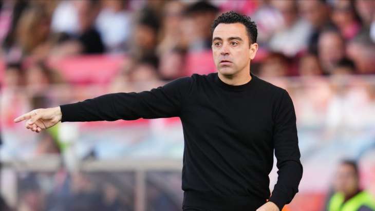 Xavi (Barça) donnant des indications