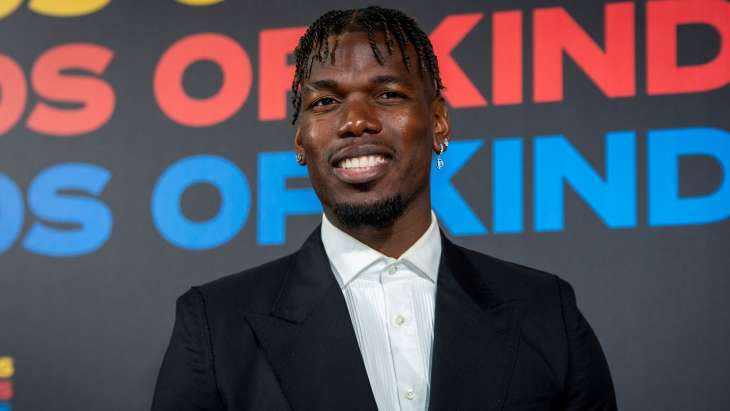 Paul Pogba tout sourire lors de sa venue à Milan en mai dernier.
